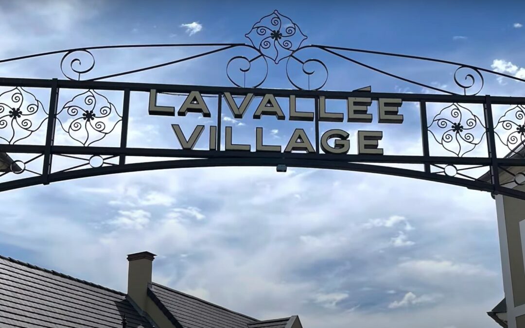 Why is La Vallee Village in Paris worth visiting?